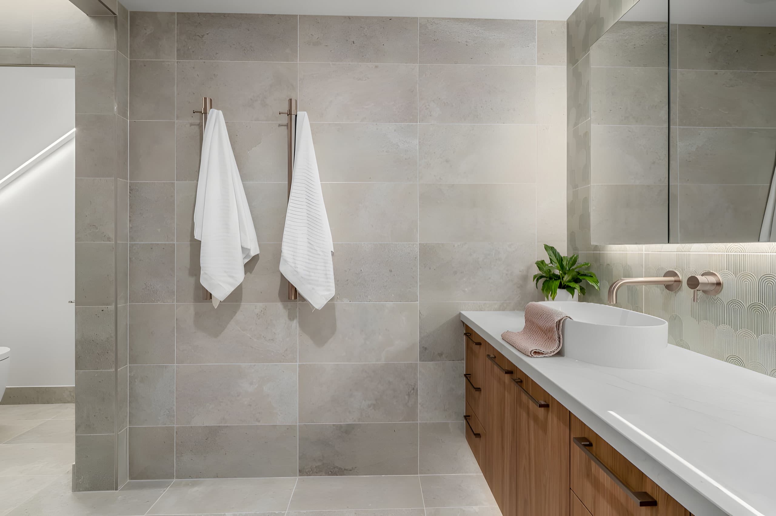 Ensuite basin, timber vanity and heated towel rails