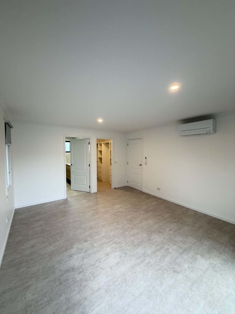 Finished extension interior with walk-in robe