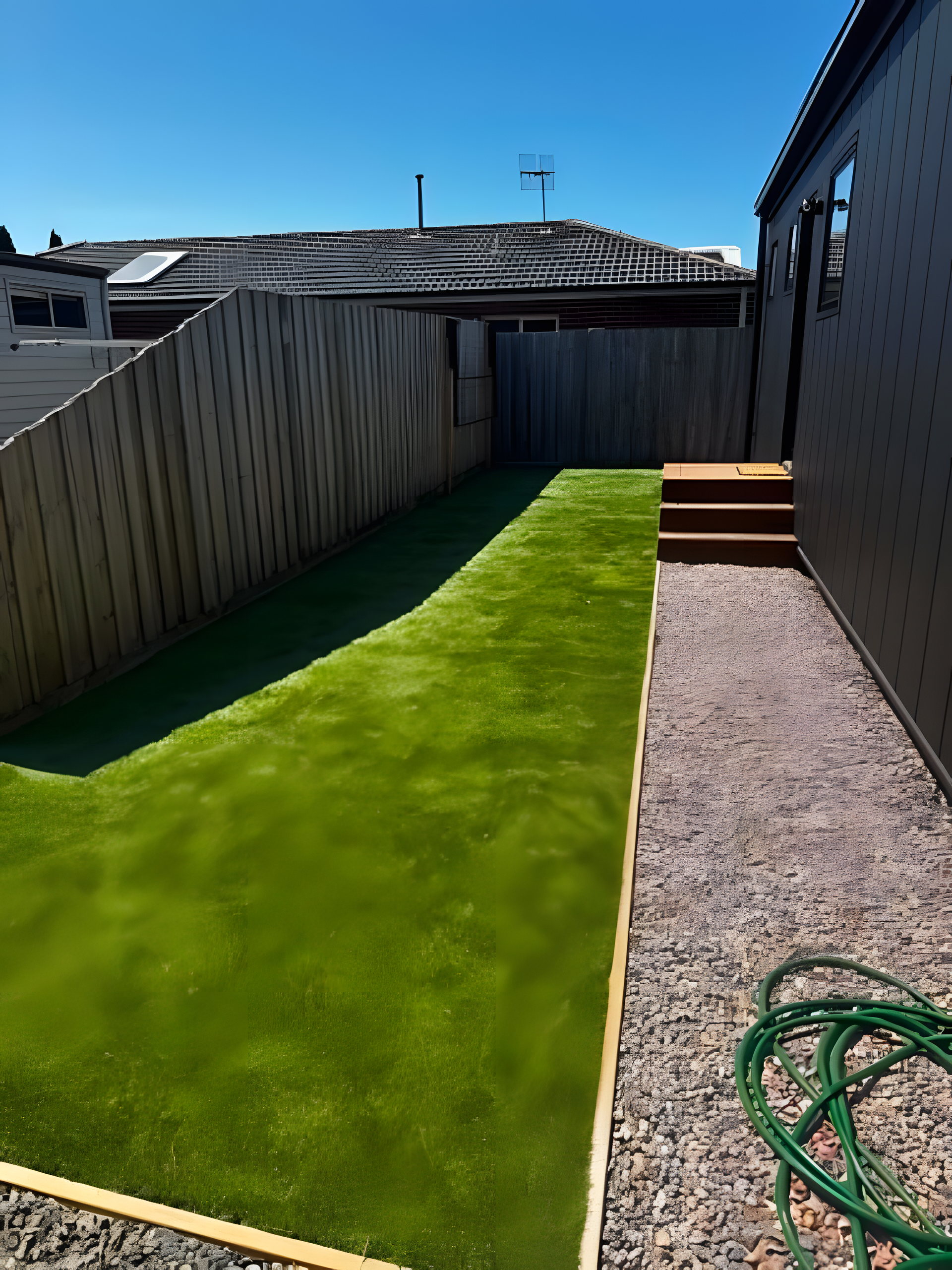 Lawn, gravel and timber steps